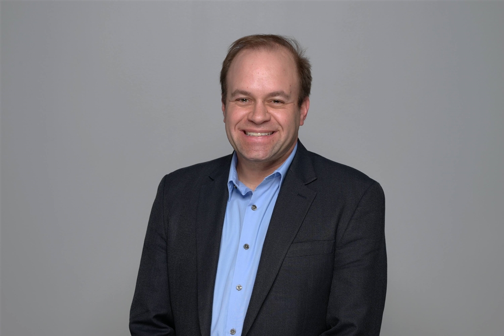 Professional portrait of Neal Ashinsky